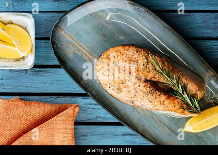 Grilled fish with herbs and lemon Stock Photo