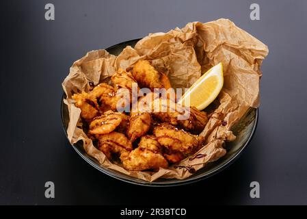 Grilled fish with herbs and lemon Stock Photo