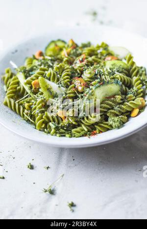 Green fusilli with herb mustard sauce Stock Photo