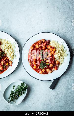 Vegan chilli sin carne with chickpeas and couscous Stock Photo