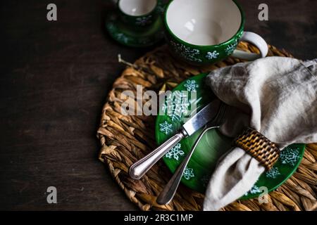 Holiday Christmas dinner place setting on wooden vintage table Stock Photo