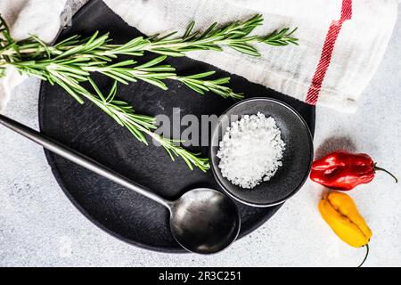 Rosemarx, sea salt and chilli peppers Stock Photo