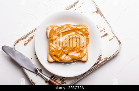 Toast with peanut butter Stock Photo