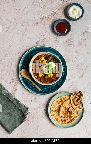 Lentil dahl with paneer, spinach and paratha Stock Photo