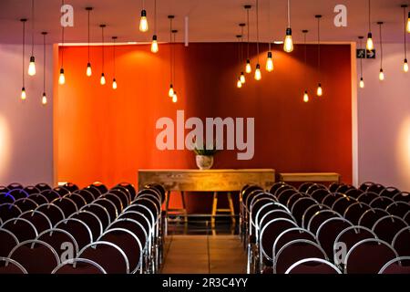 Empty chairs in large Conference hall for Corporate Convention Stock Photo