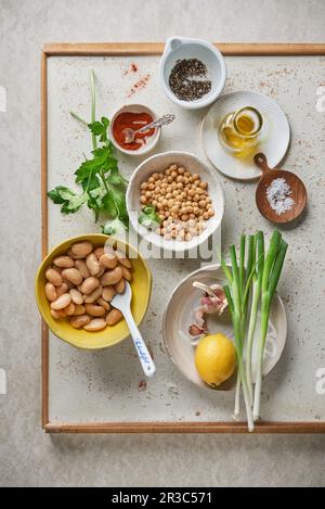 Ingredients for vegan white bean and chickpea salad Stock Photo