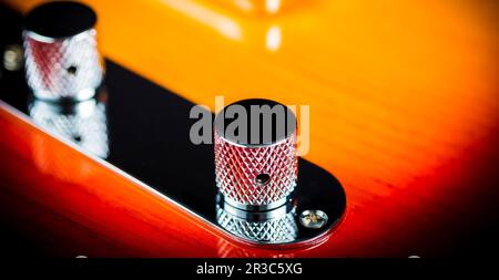 Macro Close up of a electric guitar volume knob Stock Photo