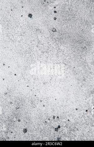 Grey abstract background texture with plaster stains and splashes. Textured gray old shabby surface Stock Photo