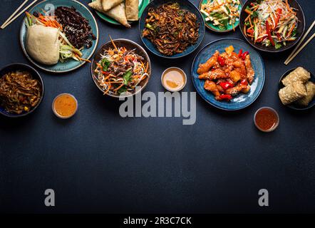 Set of Chinese dishes on table Stock Photo