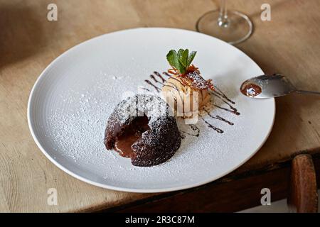 Chocolate pudding with salted caramel ice cream Stock Photo