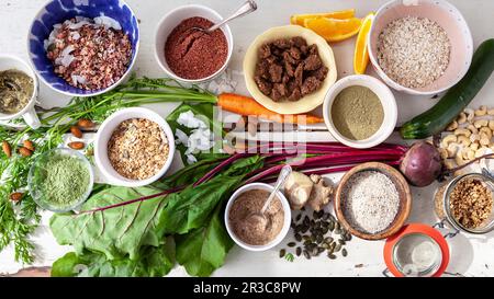 Bowl of Cold Cereal; Nuts, Milk and Apple Stock Photo