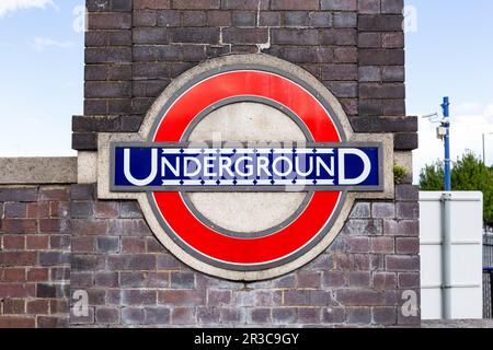 Underground roundel at Arnos Grove Stock Photo