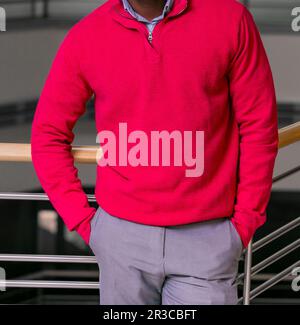 Cropped Head Man standing in a jumper sweater Stock Photo