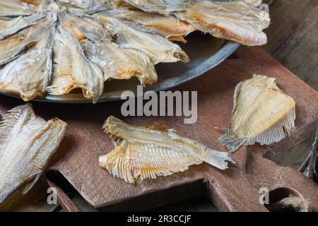 Raw dried salted Sepat fish or Malay called Ikan Sepat Kering is a famous dish in Malaysia Stock Photo