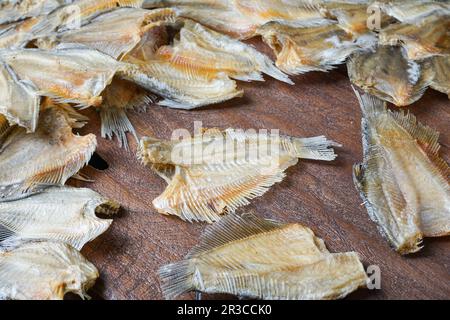 Raw dried salted Sepat fish or Malay called Ikan Sepat Kering is a famous dish in Malaysia Stock Photo