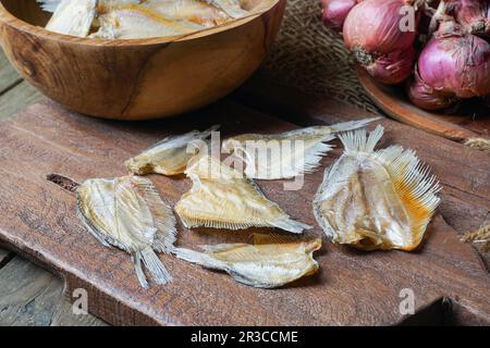 Raw dried salted Sepat fish or Malay called Ikan Sepat Kering is a famous dish in Malaysia Stock Photo