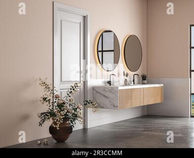 Interior of modern bathroom with white tiles and beige walls, concrete floor, double white sink on marble countertop with oval mirrors above it and co Stock Photo
