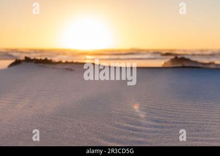 Beach sand with ripples and waves texture pattern Stock Photo