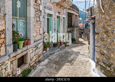 Narrow street in mountain village of Tseria, near Kardamyli, Messenian Mani, Exo Mani, Peloponnese peninsula, Peloponnese region, Greece Stock Photo