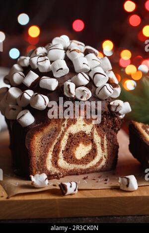 Christmas cake. Chocolate cake cutaway. Christmas baking. Preparations for the holiday. Christmas de Stock Photo