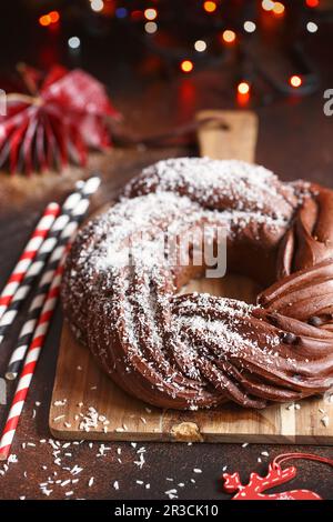 Sweet Bread Wreath. Chocolate brioche garland with coconut flakes. Holiday recipes. Braided Bread. C Stock Photo