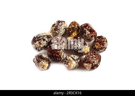 Pitted dates isolated on white background. dates filled with peanut butter and sprinkled with coconu Stock Photo