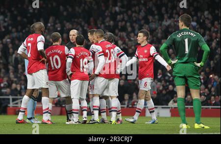 The Arsenal complain to the referee Mike Dean after he send off Arsenal's Laurent Koscielny. Man City beat Arsenal 2:0Arsenal 13/01/13 Arsenal V Manch Stock Photo