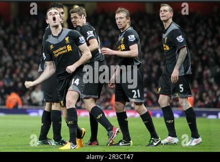 Liverpool's Jordan Henderson celebrates scoring his sides second goal with his team mates. Final score Arsenal drew against Liverpool 2:2Arsenal 30/01 Stock Photo