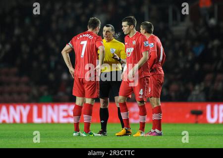Referee Mr N Swarbrick has words with (L-R) Rickie Lambert, Morgan Schneiderlin and Gaston Ramirez of Southampton during the Barclays Premier League m Stock Photo