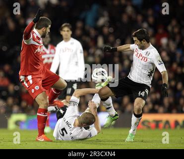 Queens Park Rangers' Adel Taarabt battles with Fulham's Giorgos Karagounis and Fulham's Brede Hangeland. Fulham beat QPR 3:2Fulham 01/04/13 Fulham V Q Stock Photo