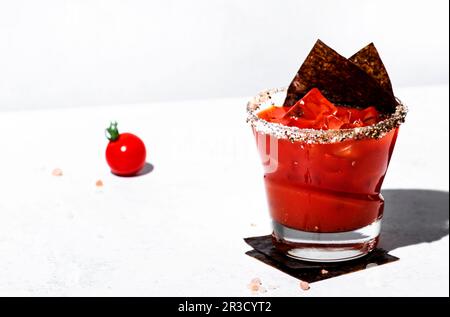 https://l450v.alamy.com/450v/2r3cyt2/miso-bloody-mary-alcoholic-cocktail-drink-with-tomato-juice-japan-spices-vodka-and-nori-white-background-hard-light-steel-bar-tools-2r3cyt2.jpg