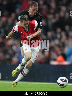 Wigan Athletic's James McCarthy battles with Arsenal's Aaron Ramsey. Arsenal beat Wigan 4:1Arsenal 14/05/13 Arsenal V Wigan Athletic  14/05/13 The Pre Stock Photo