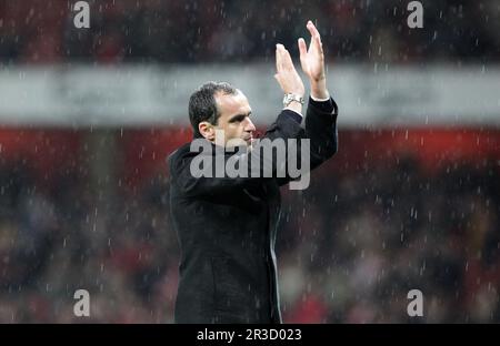 Wigan Athletic's Manager Roberto Martinez thanks the Wigan fans for their support at the end of the game. Arsenal beat Wigan 4:1 and Wigan are relegat Stock Photo