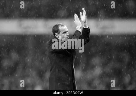 Wigan Athletic's Manager Roberto Martinez thanks the Wigan fans for their support at the end of the game. Arsenal beat Wigan 4:1 and Wigan are relegat Stock Photo