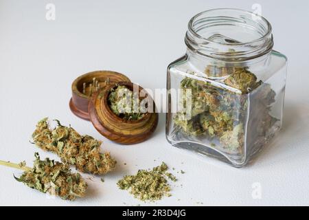 Premium Photo  Grinder with marijuana close up cannabis use in healthcare  blurry background with weed buds