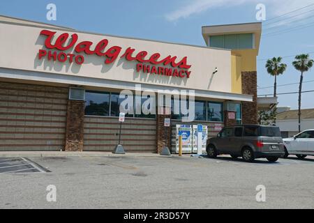 Los Angeles, California / USA - April 30, 2023: A Walgreens store location exterior, advertising photo and pharmacy services, is shown during the day. Stock Photo