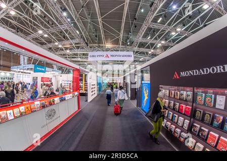 Turin, Italy - May 22, 2023: Exhibition booths of Mondadori and Einaudi publishing house in the aisle of the Turin International Book Fair in Lingotto Stock Photo