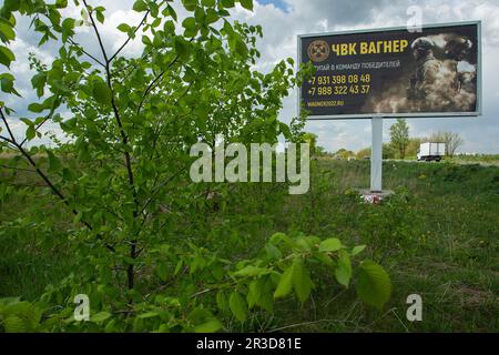 Saint Petersburg, Russia. 22nd May, 2023. A billboard depicting Russian servicemen and an advertisement for a private military company, PMC Wagner, with the inscription 'Join the winning team'. On May 20, 2023, the founder of a private military company, Yevgeny Prigozhin, made a statement that the PMC Wagner group had completely taken the city of Bakhmut under its control. (Photo by Artem Priakhin/SOPA Images/Sipa USA) Credit: Sipa USA/Alamy Live News Stock Photo