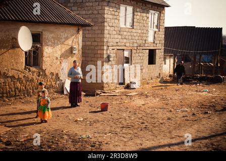 SEREDNIE, UKRAINE - MARCH 09, 2011: Kids growing in poverty with limited access to education Stock Photo