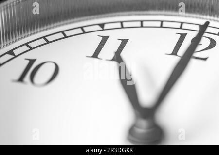 Eleven o'clock on clock face Stock Photo