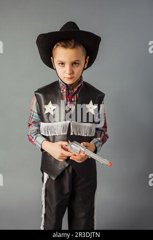 The little boy in a sheriff's costume full length Stock Photo