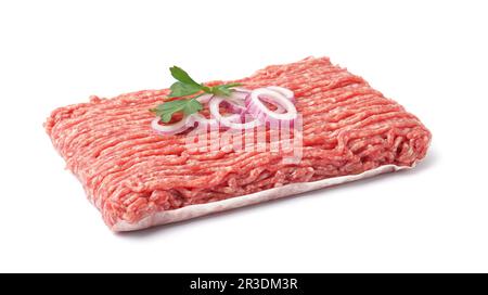 Fresh minced meat with parsley and onion rings isolated on white background Stock Photo