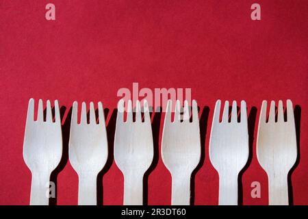 Eco friendly fast food containers. Wooden forks. Eco friendly disposable tableware. Used in fast food, restaurants, takeaways, p Stock Photo
