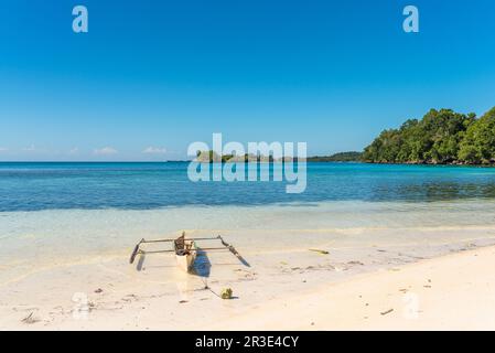 White sandy beach on Togian island Batudaka in Sulawesi Stock Photo