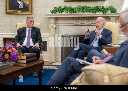 Washington, United States Of America. 22nd May, 2023. Washington, United States of America. 22 May, 2023. U.S President Joe Biden, right, comments during a meeting with House Speaker Kevin McCarthy, left, during discussion on the debt ceiling at the Oval Office of the White House, May 22, 2023 in Washington, DC Credit: Adam Schultz/White House Photo/Alamy Live News Stock Photo