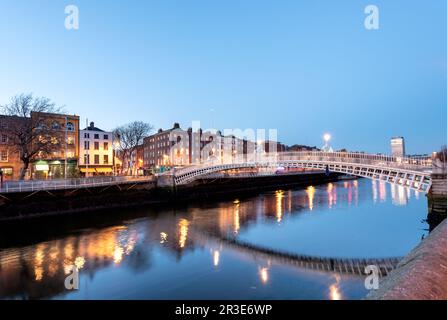 A famous tourist attraction in Dublin, Ireland, Ha'penny Bridge. Stock Photo