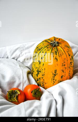 Autumn fruit thanksgiving background with persimmons, pomegranate ...