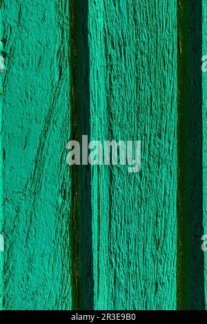 Macro texture of old faded paint on wooden timber planks Stock Photo