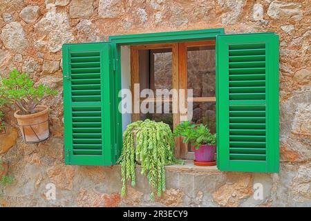 Photo taken on the island of Palma de Mallorca. The picture shows a traditionally decorated window of one of the residential buildings in the village Stock Photo