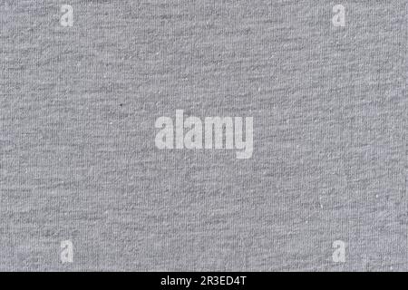 Gray cotton fabric, closeup macro detail of t shirt made into seamless tileable pattern, image width 20cm Stock Photo